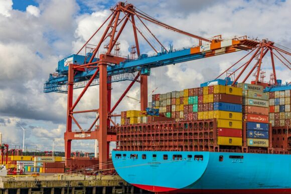 Container ship and cranes at the port of Hamburg